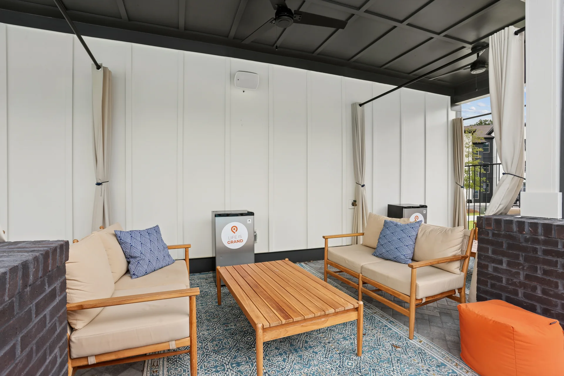 Poolside cabanas at a Pointe Grand community