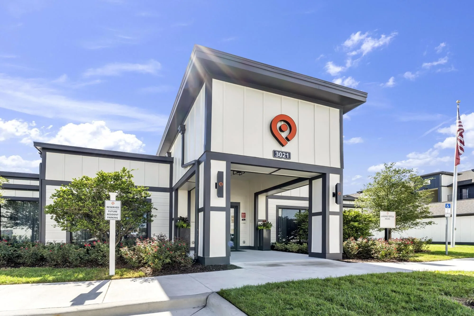 Leasing office and clubhouse entrance at a Pointe Grand community