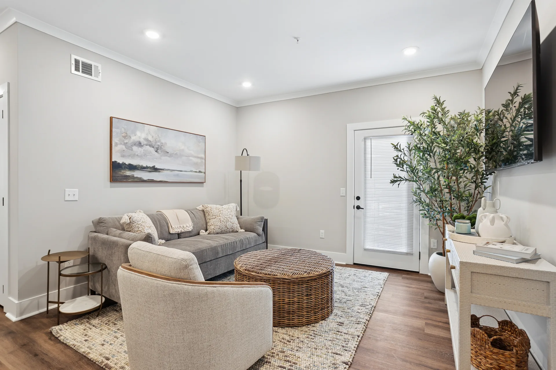 Living room in a Pointe Grand apartment home